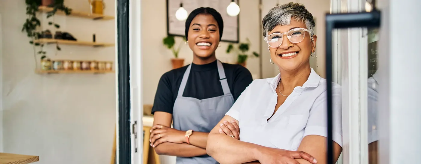 Two business owners inside their shop