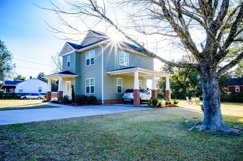 Suburban home with a car in the driveway